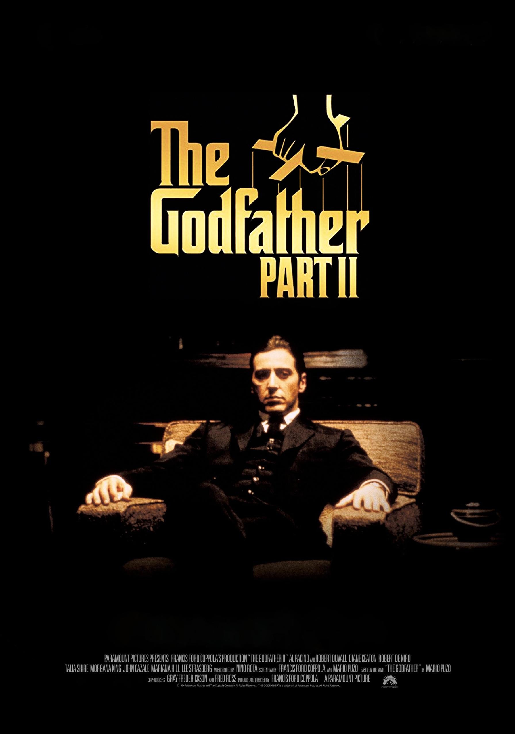 The Godfather Part II with Al Pacino as Michael Corleone sitting on a chair