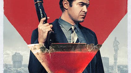 Netflix production "The Ruthless" poster with the main actor Riccardo Scamarcio holding a pumpgun in his right hand and wearing a suit.